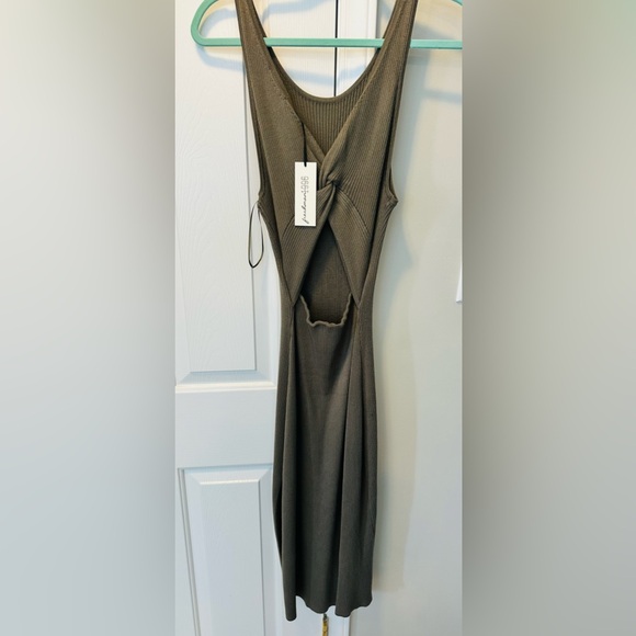 New with tags reversible dress. Stretchy!! - Picture 2 of 4